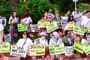 njw march join refugee day toronto